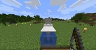 Autoclickers make this fish farm run automatically (Image via Minecraft)